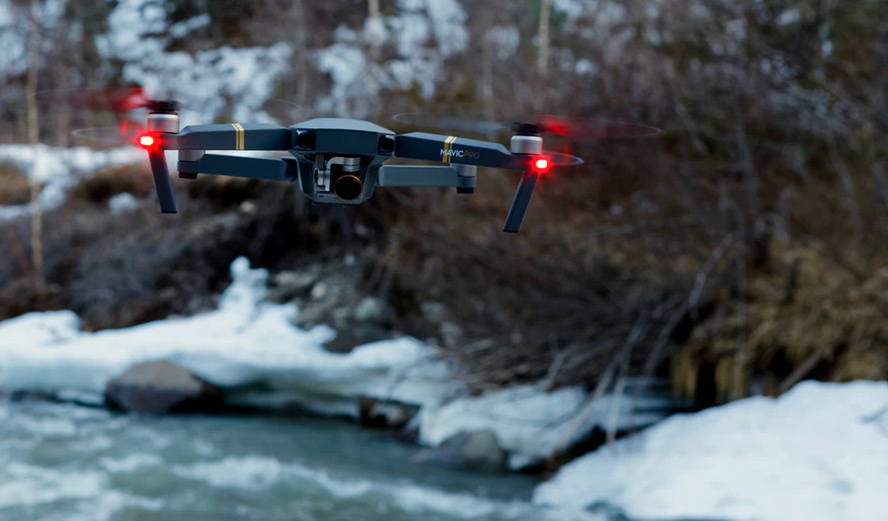 Mavic Pro Drone following over mountains
