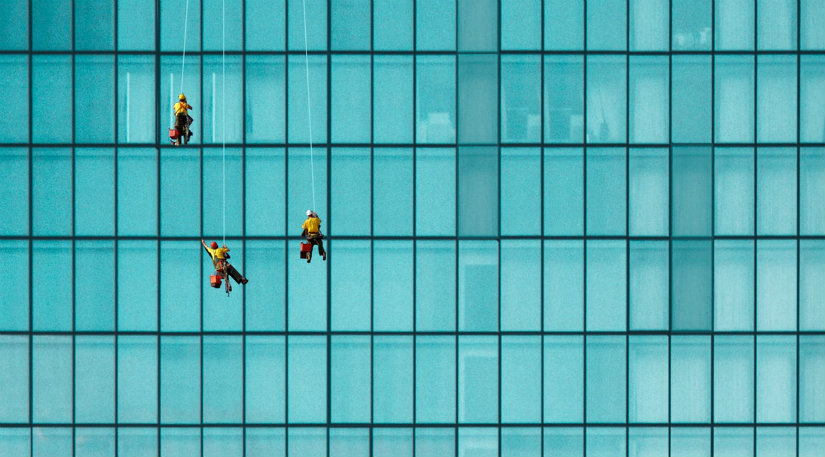 Window cleaners on a large building