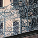 A prison with barbed wire